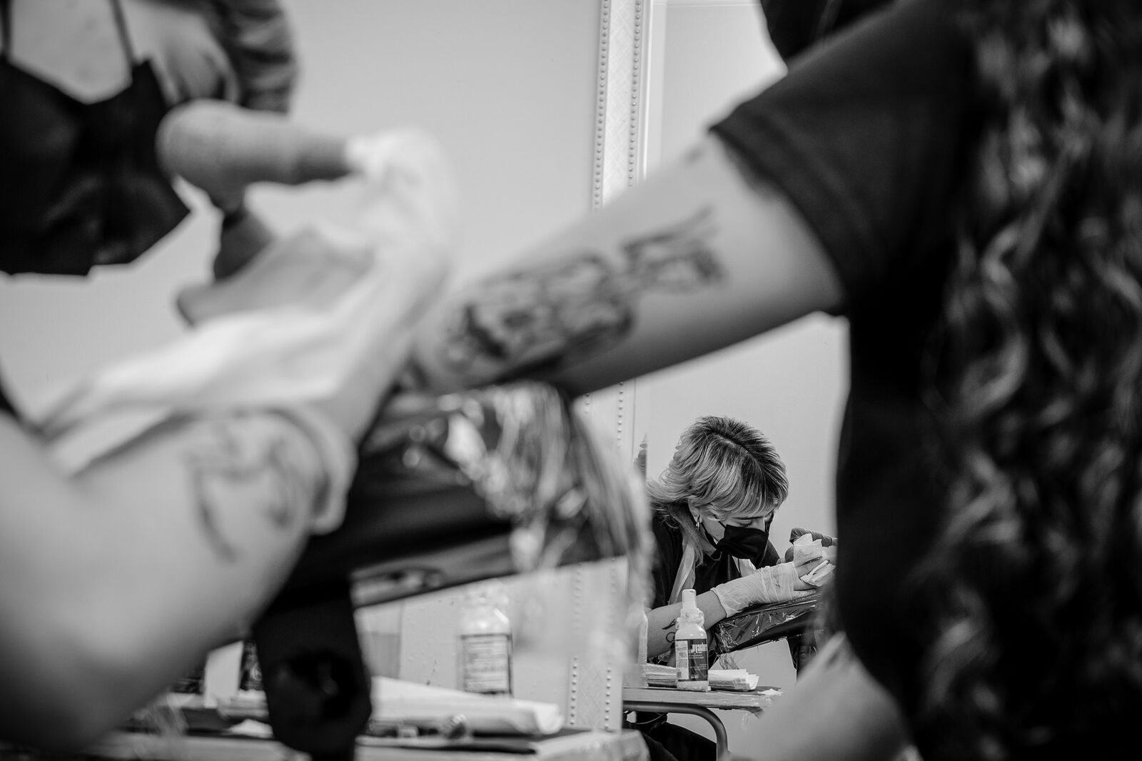 Paula tattooing in the studio